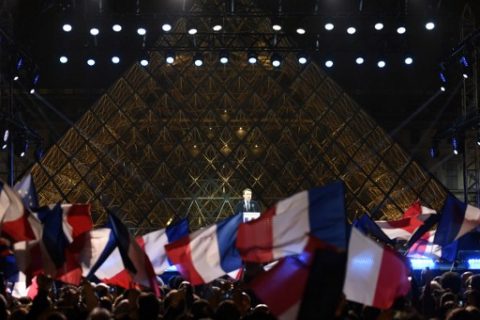 French president-elect Emmanuel Macron delivers a speech in front of the Pyramid at the Louvre Museum in Paris on May 7, 2017, after the second round of the French presidential election. Emmanuel Macron was elected French president on May 7, 2017 in a resounding victory over far-right Front National (FN - National Front) rival after a deeply divisive campaign. / AFP PHOTO / Eric FEFERBERG