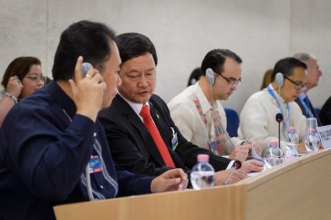 Head of the Philippines' delegation Menardo Guevarra (2nd L) listens to an assistant during the universal periodic review of the Philippines by the Office of the United Nations High Commissioner for Human Rights (OHCHR) on May 8, 2017 at the UN offices in Geneva. ???????? The Philippines' record is reviewed by the UN human rights council for the first time since the inauguration of President Rodrigo Duterte, who has been accused of massive violations in his so-called drug war. / AFP PHOTO / Fabrice COFFRINI
