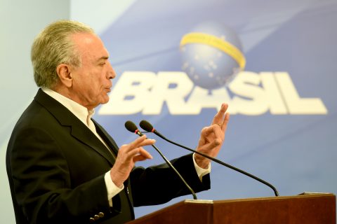 Brazilian President Michel Temer makes a statement at Planalto Palace in Brasilia, Brazil, on May 20, 2017. Temer on Saturday asked the Supreme Court to suspend a probe into his alleged obstruction of justice, saying a central piece of evidence is flawed. / AFP PHOTO / EVARISTO SA