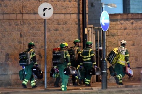 Medics deploy at the scene of a reported explosion during a concert in Manchester, England on May 23, 2017.  British police said early May 23 there were "a number of confirmed fatalities" after reports of at least one explosion during a pop concert by US singer Ariana Grande. Ambulances were seen rushing to the Manchester Arena venue and police added in a statement that people should avoid the area  / AFP PHOTO / Paul ELLIS