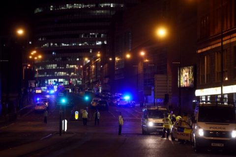 Police deploy at scene of explosion in Manchester, England, on May 23, 2017 at a concert. British police said early May 23 there were "a number of confirmed fatalities" after reports of at least one explosion during a pop concert by US singer Ariana Grande. Ambulances were seen rushing to the Manchester Arena venue and police added in a statement that people should avoid the area / AFP PHOTO / PAUL ELLIS