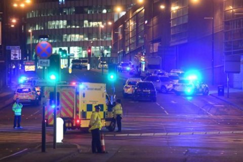 Emergency response vehicles are parked at the scene of a suspected terrorist attack during a pop concert by US star Ariana Grande in Manchester, northwest England on May 23, 2017. / AFP PHOTO / Paul ELLIS