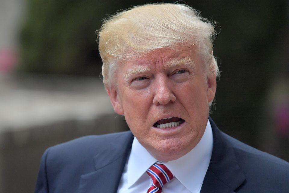 US President Donald Trump arrives at the ancient Greek Theatre of Taormina during the Heads of State and of Government G7 summit, on May 26, 2017 in Sicily. The leaders of Britain, Canada, France, Germany, Japan, the US and Italy will be joined by representatives of the European Union and the International Monetary Fund (IMF) as well as teams from Ethiopia, Kenya, Niger, Nigeria and Tunisia during the summit from May 26 to 27, 2017. / AFP PHOTO / Tiziana FABI