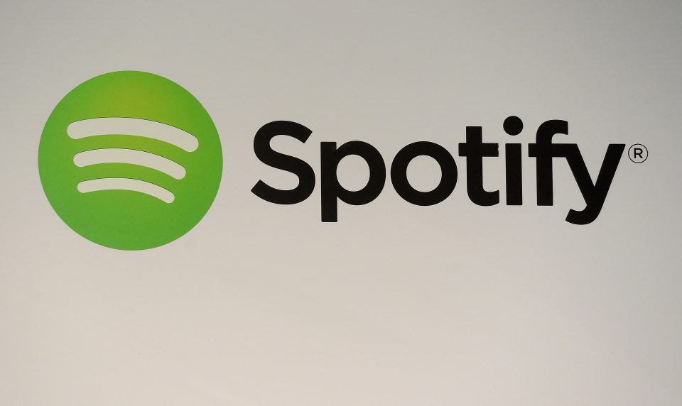 (FILES) This file photo taken on December 11, 2013 shows a Spotify logo in New York, Music streaming leader Spotify has agreed to set up a $43.45 million fund to settle a potentially costly pair of US copyright lawsuits from artists, lawyers said May 29, 2017. The move marks the latest effort by the Swedish company to turn the page on messy disputes as it considers a public listing amid the soaring growth of streaming. / AFP PHOTO / EMMANUEL DUNAND