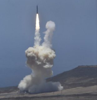 A ground based interceptor missle take off at Vandenberg Air Force base, California on May 30, 2017. The US military said it had intercepted a mock-up of an intercontinental ballistic missile in a first-of-its-kind test that comes amid concerns over North Korea's weapons program. A ground-based interceptor launched from Vandenberg Air Force Base in California "successfully intercepted an intercontinental ballistic missile target" fired from the Reagan Test Site in the Marshall Islands, the military said in a statement. / AFP PHOTO / Gene Blevins