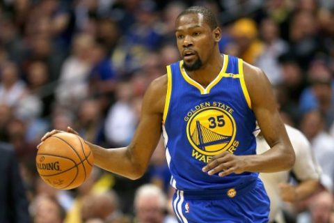 DENVER, CO - FEBRUARY 13: Kevin Durant #35 of the Golden State Warriors brings the ball down court against the Denver Nuggets at the Pepsi Center on February 13, 2017 in Denver, Colorado. NOTE TO USER: User expressly acknowledges and agrees that , by downloading and or using this photograph, User is consenting to the terms and conditions of the Getty Images License Agreement. Matthew Stockman/Getty Images/AFP