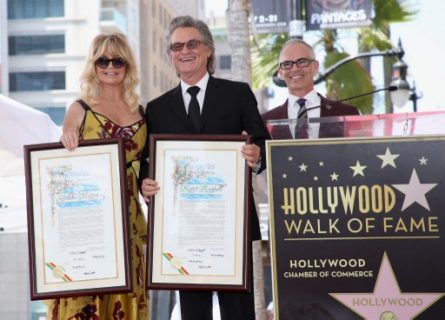 HOLLYWOOD, CA - MAY 04: (L-R) Honorees Goldie Hawn, Kurt Russell and Los Angeles Councilmember Mitch O'Farrell at Goldie Hawn and Kurt Russell are honored with a Star On the Hollywood Walk of Fame on May 4, 2017 in Hollywood, California. Jesse Grant/Getty Images for Disney/AFP