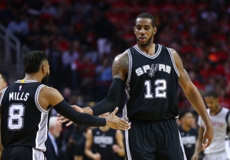 HOUSTON, TX - MAY 11: LaMarcus Aldridge #12 of the San Antonio Spurs reacts with Patty Mills #8 against the Houston Rockets during Game Six of the NBA Western Conference Semi-Finals at Toyota Center on May 11, 2017 in Houston, Texas. NOTE TO USER: User expressly acknowledges and agrees that, by downloading and or using this photograph, User is consenting to the terms and conditions of the Getty Images License Agreement. Ronald Martinez/Getty Images/AFP