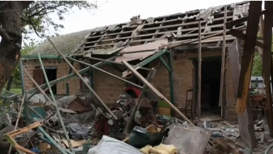 Monitors on Sunday (May 14) inspected a household in the eastern Ukrainian town of Avdiyivka which was damaged by artillery fire a day earlier. Photo grabbed from Reuters video file.