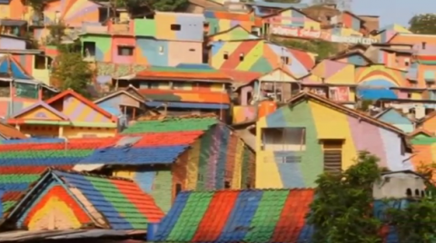Once considered a slum, Kampung Pelangi (pronounce as "Com-has become a tourist attraction for local and international visitors following a colorful makeover.(photo grabbed from Reuters video)