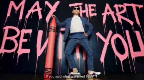 South Korean rapper Psy has gone back to basics with his eighth full-length album called "4x2=8," paying greater attention to his fans at home while doing what he loves to do most -- perform and "go crazy" on stage.(photo grabbed from Reuters video)