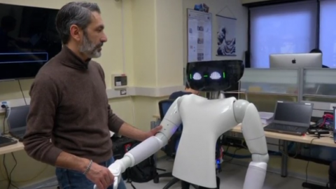 Roboticists from the Italian Institute of Technology (IIT) say their R1 robot is an affordable domestic helper able to perform simple service tasks around the home.(photo grabbed from Reuters video)