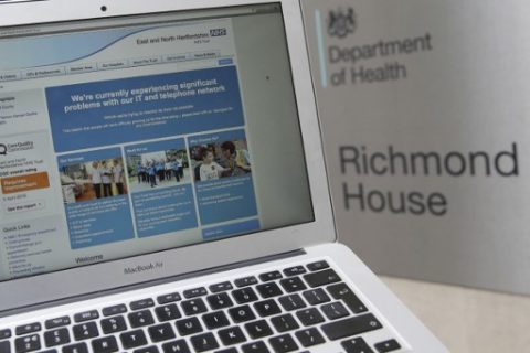 This photograph, posed as an illustration on May 12, 2017, shows the website of the NHS: East and North Hertfordshire notifying users of a problem in its network taken outside the Department of Health in London. The unprecedented global ransomware cyberattack has hit more than 200,000 victims in more than 150 countries, Europol executive director Rob Wainwright said May 14, 2017. Britain's state-run National Health Service was affected by the attack. / AFP PHOTO / Daniel LEAL-OLIVAS