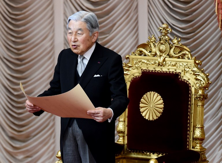 (FILES) This file photo taken on September 26, 2016 shows Japan's Emperor Akihito making a speech to open an extra Diet session at the upper house of parliament in Tokyo. Japan's lower house of parliament passed a bill on June 2, 2017 that allows ageing Emperor Akihito to step down, as it also called for a rare debate on the role of women in the male-dominated monarchy. / AFP PHOTO / Toru YAMANAKA