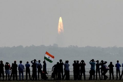 (FILES) This file photo taken on February 15, 2017 shows people watching the launch of the Indian Space Research Organisation (ISRO) Polar Satellite Launch Vehicle (PSLV-C37) at Sriharikota. India will on June 5, 2017 launch its most powerful homegrown rocket to date, another milestone for its indigenous space exploration programme that one day hopes to put a man into orbit. / AFP PHOTO / ARUN SANKAR