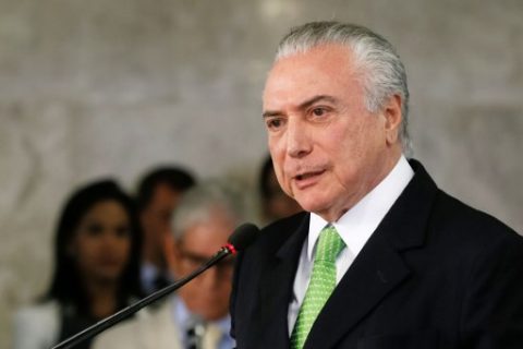 Handout picture released by the Brazilian Presidency showing Brazil's President Michel Temer speaking during a ceremony in commemoration of the World Environment Day, at the Planalto Palace in Brasilia, Brazil, on June 5, 2017. President Michel Temer and Brazil's chief prosecutor were in open warfare Monday on the eve of a court verdict that could lead to the scandal-plagued president's removal from office. / AFP PHOTO / BRAZILIAN PRESIDENCY / BETO BARATA / RESTRICTED TO EDITORIAL USE - MANDATORY CREDIT "AFP PHOTO / BRAZILIAN PRESIDENCY / BETO BARATA" - NO MARKETING NO ADVERTISING CAMPAIGNS - DISTRIBUTED AS A SERVICE TO CLIENTS