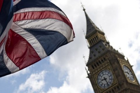 A Union flag lies from a flagpole opposite the Elizabeth Tower, commonly reffered to as Big Ben, at the Houses of Parliament in central London on June 7, 2017. Britain on Wednesday headed into the final day of campaigning for a general election darkened and dominated by jihadist attacks in two cities, leaving forecasters struggling to predict an outcome on polling day. / AFP PHOTO / Justin TALLIS