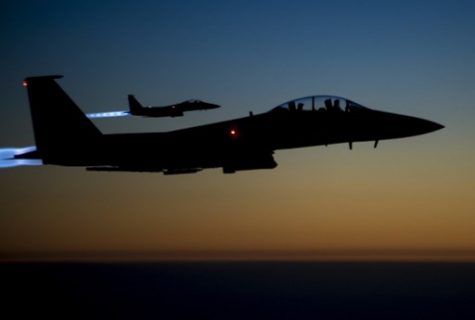 (FILES) This file photo taken by the US Air Forces Central Command and released by the Defense Video & Imagery Distribution System (DVIDS) shows a pair of US Air Force F-15E Strike Eagles flying over northern Iraq early in the morning of September 23, 2014 after conducting airstrikes in Syria. A US warplane shot down an Iran-made drone operated by pro-regime forces in southern Syria early on June 20, 2017, officials said, the second such incident in less than two weeks. The US-led coalition said in a statement that an F-15E Strike Eagle jet destroyed the Shaheed-129 drone around 12:30 am (2130 GMT) northeast of the Al-Tanaf garrison, which is close to the Jordanian border. / AFP PHOTO / US Air Forces Central Command / Senior Airman Matthew Bruch