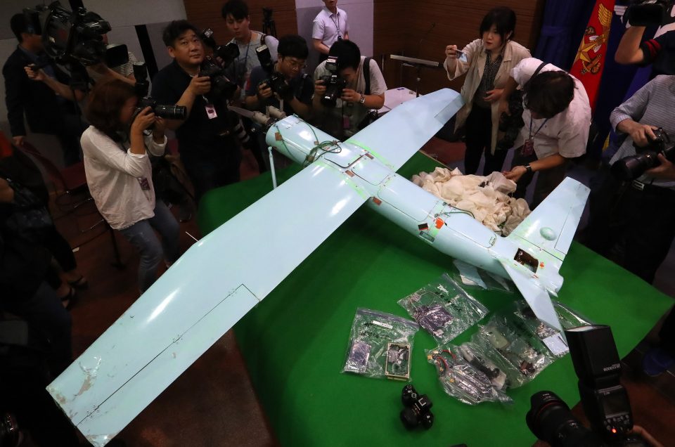 An alleged North Korean drone is displayed to the media at the Defence Ministry in Seoul on June 21, 2017. South Korea described drones believed sent from North Korea a "grave provocation" in violation of the armistice and requested a UN probe into a drone that recently crashed at the border area. The small drone equipped with a camera took photos of the US's recently installed THAAD missile defense system in the southern region of South Korea, Seoul military said after retrieving it on June 9. / AFP PHOTO / YONHAP / YONHAP / - South Korea OUT / REPUBLIC OF KOREA OUT NO ARCHIVES RESTRICTED TO SUBSCRIPTION USE