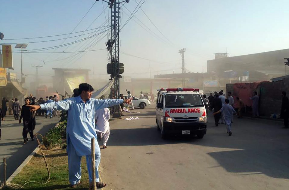 An ambulance of transports victims after a twin blasts at a market in the Pakistani city of Parachinar, capital of Kurram tribal district, on June 23, 2017. At least 11 people were killed and 24 wounded on Friday when twin blasts tore through a market crowded with shoppers preparing for the Eid holidays in a mainly Shiite area of Pakistan's tribal belt. / AFP PHOTO / STR