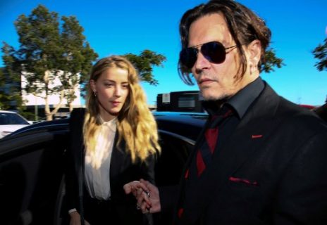 (FILES) A file photo taken on April 18, 2016, show US actor Johnny Depp (R) and his former wife Amber Heard arriving at a court in the Gold Coast. Johnny Depp's Australian nemesis, Deputy Prime Minister Barnaby Joyce, suggested on June 27, 2017 he could unleash perjury charges against the Hollywood A-lister in the latest chapter to a case dubbed the "war on terrier". Depp and his then-wife Amber Heard fell foul of Australia's strict quarantine laws when they failed to declare her pet dogs Pistol and Boo on arrival in the country on a private jet in 2015. / AFP PHOTO / PATRICK HAMILTON