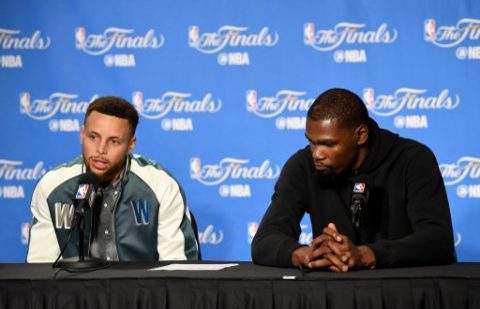 OAKLAND, CA - JUNE 01: Stephen Curry #30 and Kevin Durant #35 of the Golden State Warriors speak to members of the press following Game 1 of the 2017 NBA Finals at ORACLE Arena on June 1, 2017 in Oakland, California. NOTE TO USER: User expressly acknowledges and agrees that, by downloading and or using this photograph, User is consenting to the terms and conditions of the Getty Images License Agreement.   Thearon W. Henderson/Getty Images/AFP