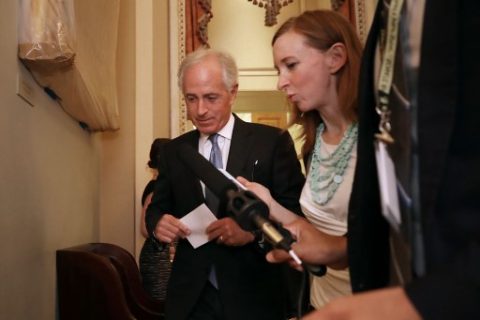 WASHINGTON, DC - JUNE 22: Sen. Bob Corker (R-TN) (L) talks with reporters following a meeting of GOP senators in the U.S. Capitol June 22, 2017 in Washington, DC. Most Republican senators were given their first opportunity to look at legislation aimed at overhauling the Affordable Care Act during the closed door meeting. Chip Somodevilla/Getty Images/AFP