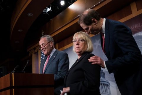 NEW YORK, NY - JUNE 26: (L to R) Senate Minority Leader Chuck Schumer (D-NY) speaks as Sen. Patty Murray (D-WA) listens to Sen. Ron Wyden (D-OR) during a press conference about the Senate Republican health care bill, on Capitol Hill, June 26, 2017 in Washington, DC. According to the Congressional Budget Office report released on Monday, the Senate GOP health care bill could result in 22 million fewer Americans with health insurance. Drew Angerer/Getty Images/AFP