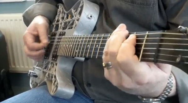 A Swedish-based pioneer of 3D printed musical guitars says that creating a new aluminium version - dubbed 'Heavy Metal' - has proved his greatest challenge yet. (Photo grabbed from Reuters video)