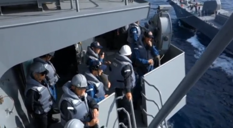 Guests on board Japan's war ship that sailed into the South China Sea recently. (Photo grabbed from Reuters video)