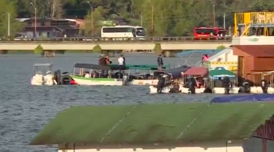 Nine people died and 28 are missing after a multi-decked tourist boat carrying about 170 passengers sank in Colombia's Penol-Guatape reservoir on Sunday during the long holiday weekend, a government official said. Photo grabbed from Reuters video file.