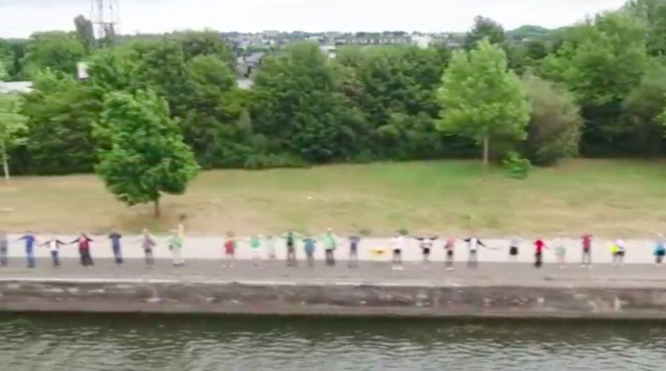 Thousands of protesters formed a human chain on Sunday (June 25) to demand the closure of two Belgian nuclear reactors, Tihange and Doel. Photo grabbed from Reuters video file.