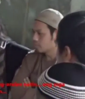 Alleged Malaysian militant financier Mahmud bin Ahmad in a video where Abu Sayyaf leader Isnilon Hapilon and Abdullah Maute were seen planning the Marawi attack.  (Photo grabbed from June 7 Reuters-provided video) 