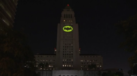  The late actor Adam West was honored by the city of Los Angeles on Thursday with a ceremonial lighting of the iconic Bat-Signal onto the City Hall building.(photo grabbed from Reuters video)