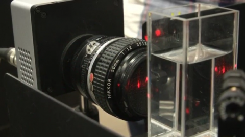 Researchers at Sweden's Lund University develop a camera contraption that can film at a rate equivalent to five trillion images per second.(photo grabbed from Reuters video)