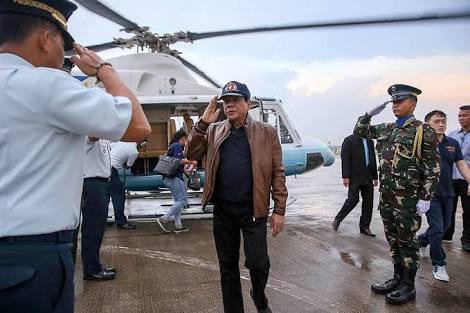 President Rodrigo Duterte is seen saluting government troops. The Palace said the picture was taken at the Villamor Airbase on Thursday.