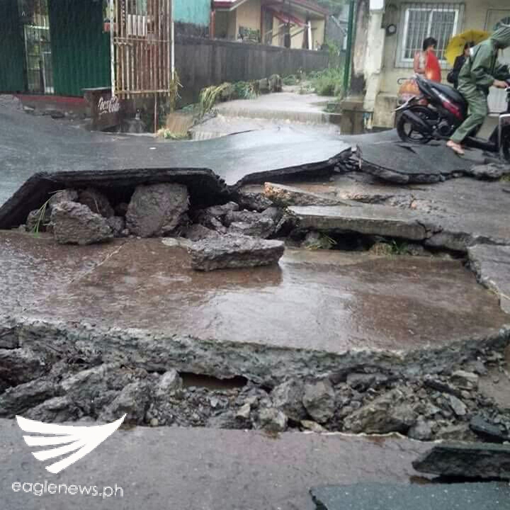Heavy rains, floods brought by Maring destroy a part of Batas road in Cavite on Sept. 12, 2017